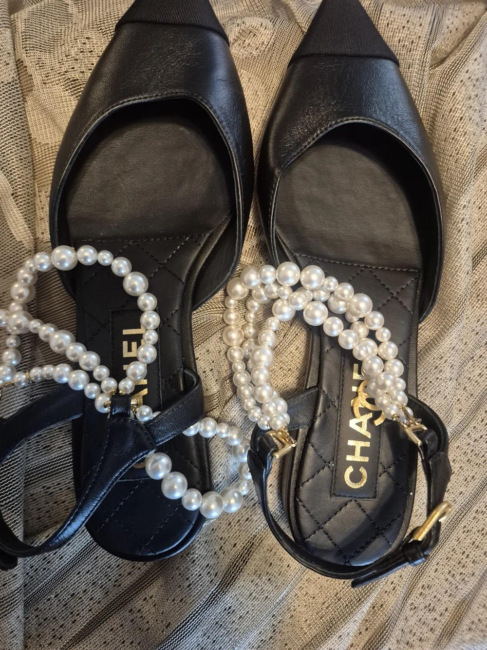CHANEL black leather pointed-toe flats with pearls
